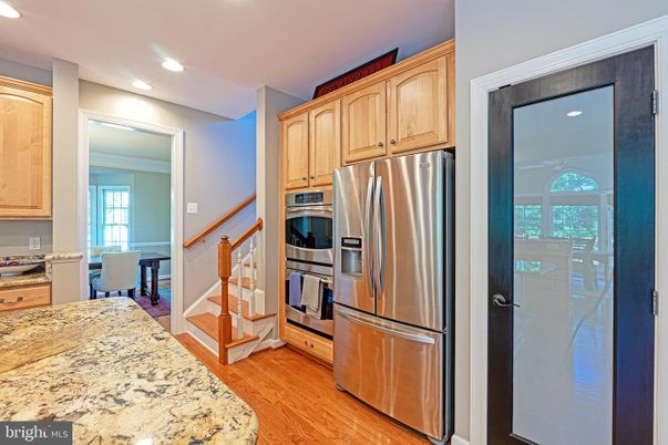 Dining room, Interior, Kitchen, Recessed Lighting, Stainless Steel Appliances, Wood Texture Flooring