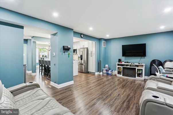 Home Theatre Room, Dining room, Interior, Kitchen, Living room, Recessed Lighting, Stainless Steel Appliances, Theatre Room, Wood Texture Flooring