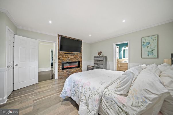 Bedroom, Fireplace, Interior, Recessed Lighting, Wood Texture Flooring