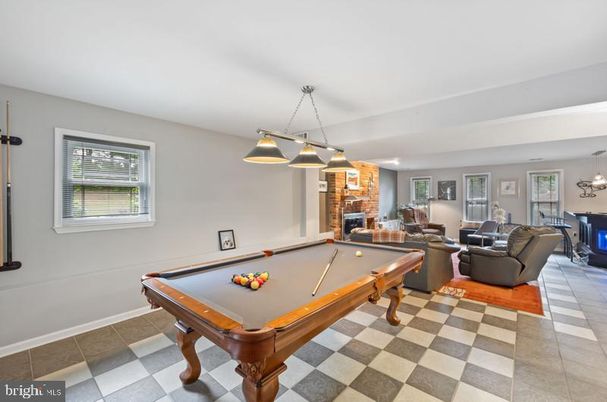 Billiard Table, Chandelier, Fireplace, Game Room, Interior, Living room, Pendant Lights