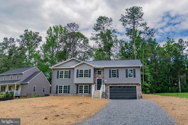 Attached, Exterior, Facade, Raised Ranch