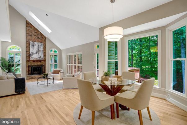 Dining room, Fireplace, Interior, Living room, Pendant Lights, Stone Walls, Wood Texture Flooring