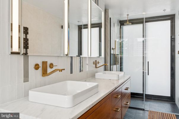 Bathroom, Dual Sink Vanities, Glass Shower, Interior, Wood Texture Flooring