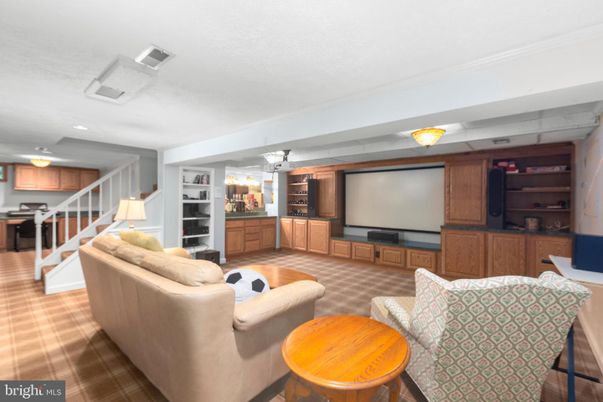 Interior, Living room, Projection Screen, Recessed Lighting, Theatre Room, Wood Texture Flooring