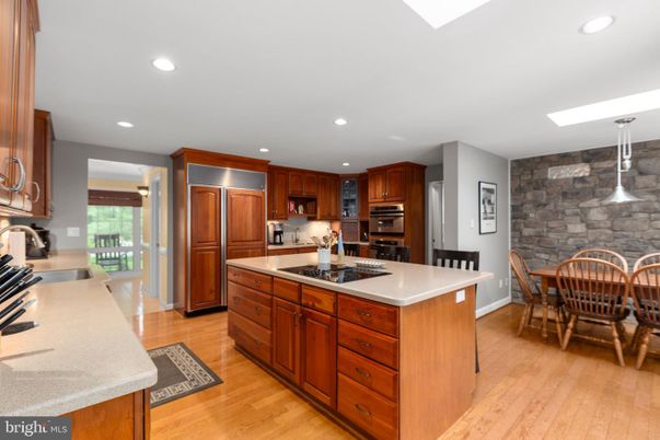 Dining room, Interior, Kitchen, Pendant Lights, Recessed Lighting, Stainless Steel Appliances, Stone Walls, Wood Texture Flooring