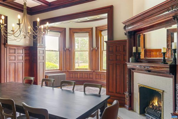 Chandelier, Dining room, Fireplace, Interior, Wooden Beams