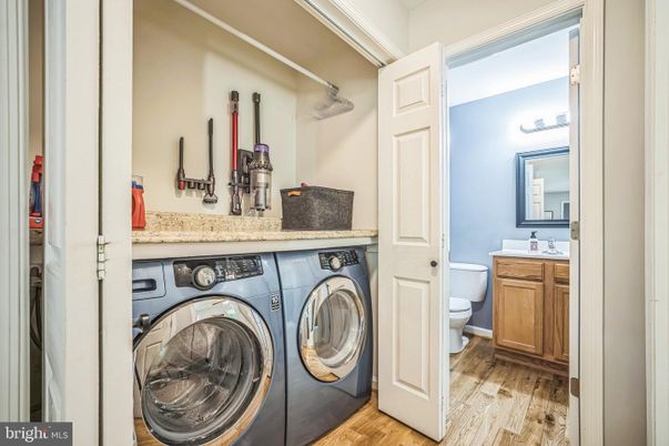 Bathroom, Interior, Utility Closets, Washer, Wood Texture Flooring