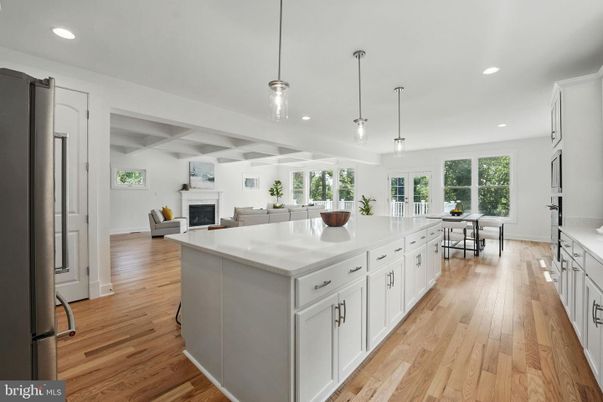 Dining room, Fireplace, Interior, Kitchen, Living room, Pendant Lights, Recessed Lighting, Wood Texture Flooring