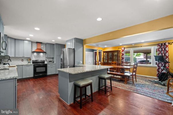 Dining room, Interior, Kitchen, Recessed Lighting, Stainless Steel Appliances, Wood Texture Flooring