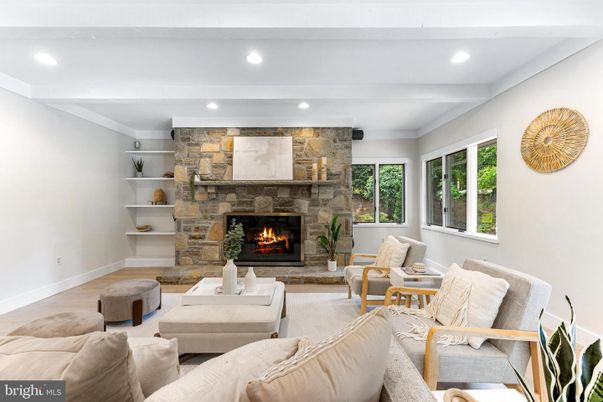 Fireplace, Interior, Living room, Recessed Lighting, Stone Walls, Wood Texture Flooring