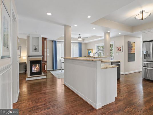 Fireplace, Interior, Kitchen, Recessed Lighting, Stainless Steel Appliances, Wood Texture Flooring