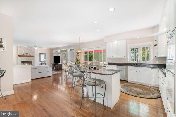 Dining room, Fireplace, Interior, Kitchen, Living room, Pendant Lights, Recessed Lighting, Wood Texture Flooring