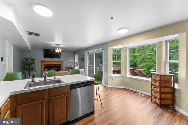 Fireplace, Interior, Kitchen, Recessed Lighting, Wood Texture Flooring