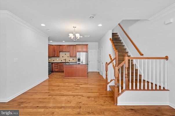 Chandelier, Interior, Kitchen, Recessed Lighting, Stainless Steel Appliances, Wood Texture Flooring