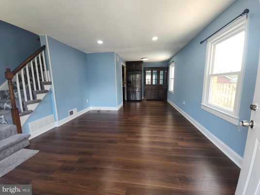 Empty room, Interior, Recessed Lighting, Stainless Steel Appliances, Wood Texture Flooring