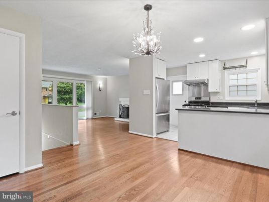 Chandelier, Interior, Kitchen, Pendant Lights, Recessed Lighting, Stainless Steel Appliances, Wood Texture Flooring