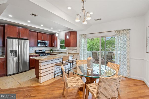 Dining room, Interior, Kitchen, Pendant Lights, Recessed Lighting, Stainless Steel Appliances, Wood Texture Flooring