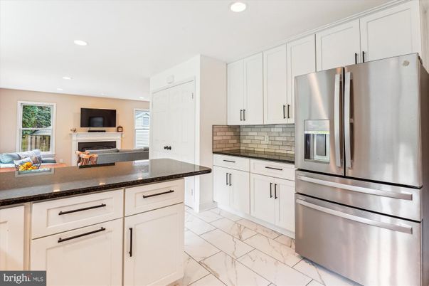 Fireplace, Interior, Kitchen, Marble, Recessed Lighting, Stainless Steel Appliances