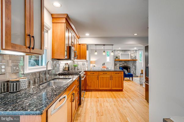 Fireplace, Interior, Kitchen, Pendant Lights, Recessed Lighting, Stone Walls, Wood Texture Flooring