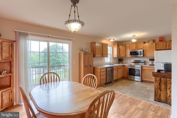 Dining room, Interior, Kitchen, Pendant Lights, Stainless Steel Appliances, Wood Texture Flooring