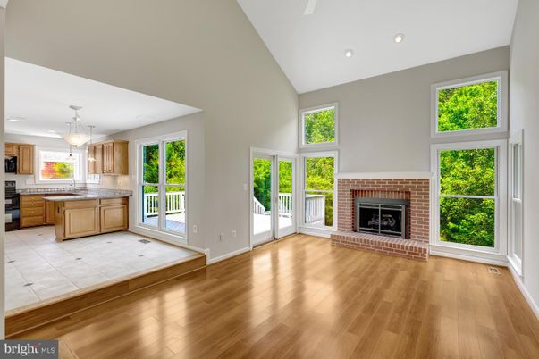 Empty room, Fireplace, Interior, Kitchen, Pendant Lights, Recessed Lighting, Wood Texture Flooring