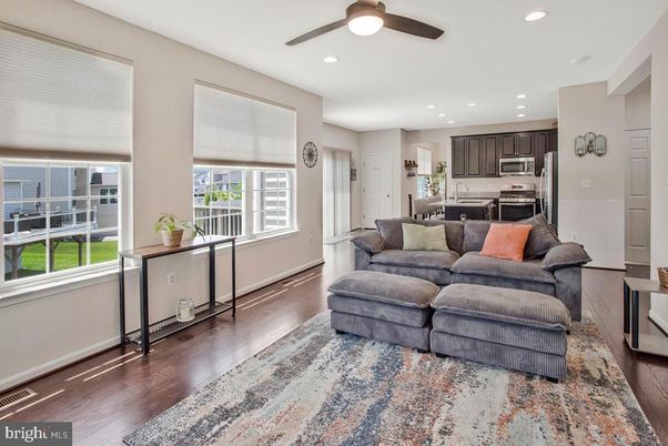Dining room, Interior, Kitchen, Living room, Recessed Lighting, Stainless Steel Appliances, Wood Texture Flooring
