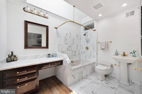 Bathroom, Dual Sink Vanities, Interior, Marble, Marble Walls, Recessed Lighting
