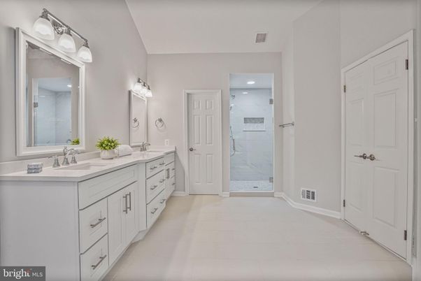 Bathroom, Dual Sink Vanities, Glass Shower, Interior, Marble Walls, Recessed Lighting