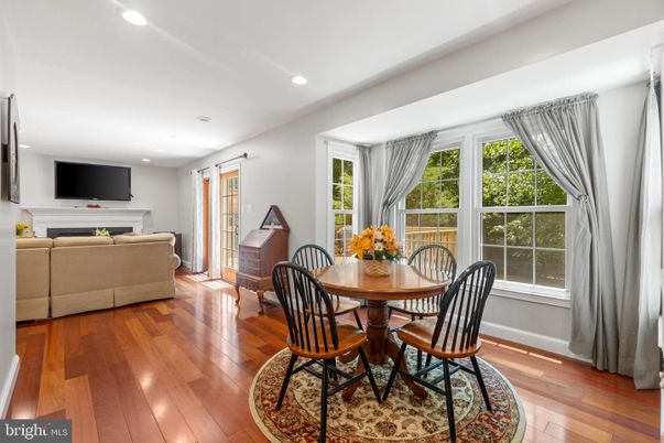 Dining room, Fireplace, Interior, Living room, Recessed Lighting, Wood Texture Flooring