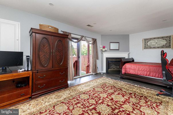 Bedroom, Fireplace, Interior, Recessed Lighting, Wood Texture Flooring