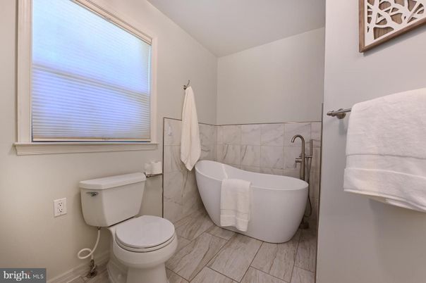 Bathroom, Free Standing Baths, Interior, Marble Walls, Wood Texture Flooring