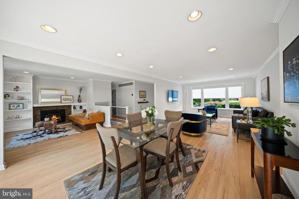 Dining room, Fireplace, Interior, Living room, Recessed Lighting, Wood Texture Flooring