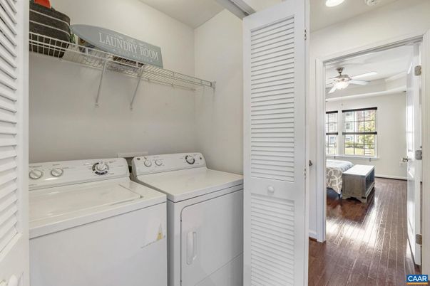 Bedroom, Interior, Recessed Lighting, Utility Closets, Washer, Wood Texture Flooring