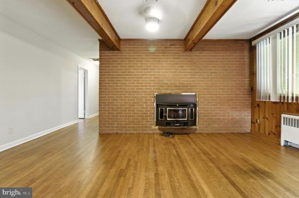 Empty room, Fireplace, Interior, Stone Walls, Wood Texture Flooring