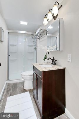 Bathroom, Glass Shower, Interior, Recessed Lighting, Wood Texture Flooring