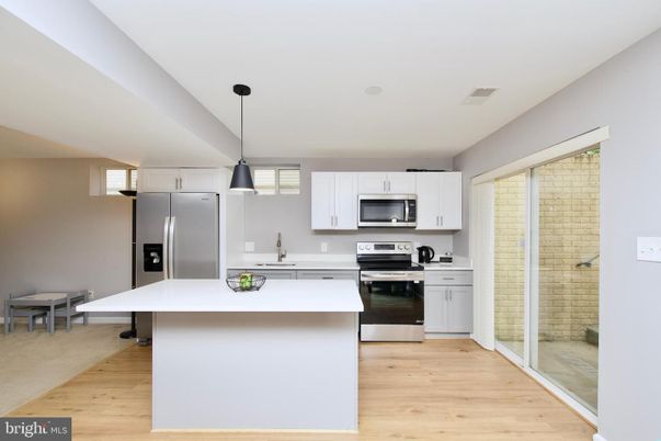 Interior, Kitchen, Pendant Lights, Stainless Steel Appliances, Wood Texture Flooring