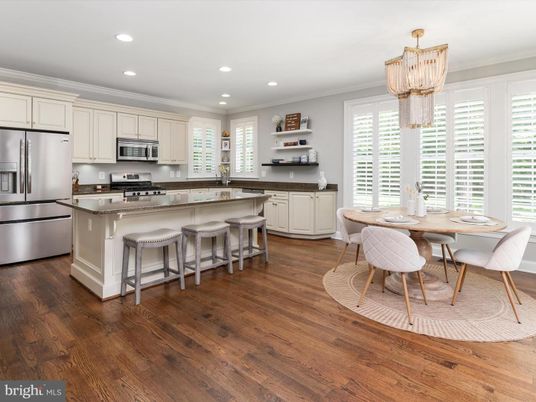 Chandelier, Dining room, Interior, Kitchen, Recessed Lighting, Stainless Steel Appliances, Wood Texture Flooring