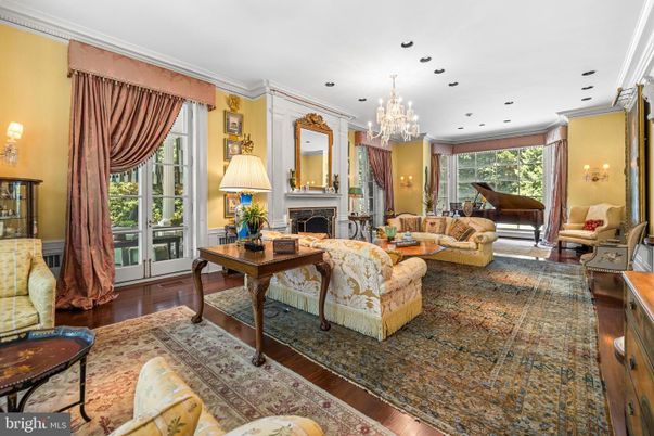 Chandelier, Fireplace, Interior, Living room, Piano, Recessed Lighting, Wood Texture Flooring