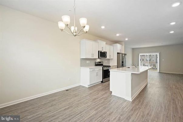 Chandelier, Interior, Kitchen, Recessed Lighting, Stainless Steel Appliances, Wood Texture Flooring