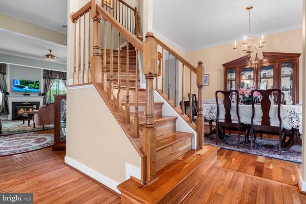 Chandelier, Dining room, Fireplace, Interior, Wood Texture Flooring