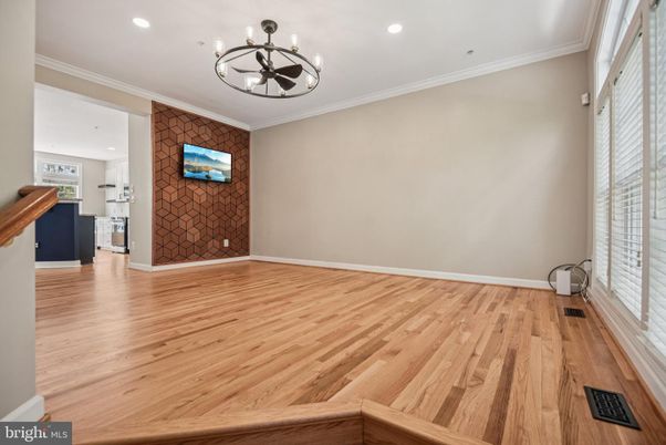 Chandelier, Empty room, Fireplace, Interior, Recessed Lighting, Wood Texture Flooring