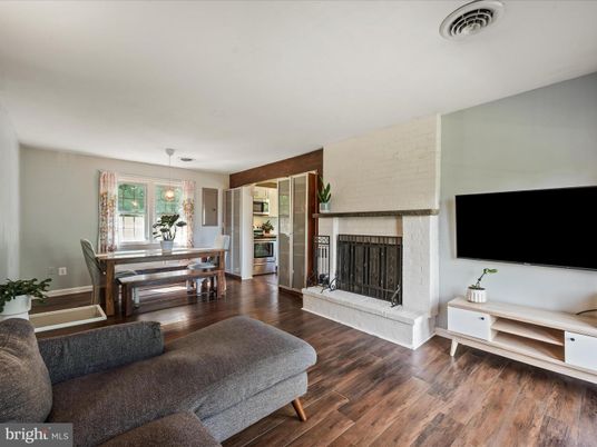 Dining room, Fireplace, Interior, Pendant Lights, Wood Texture Flooring