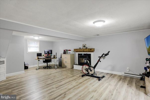Fireplace, Fitness Equipment, Home Office, Interior, Wood Texture Flooring
