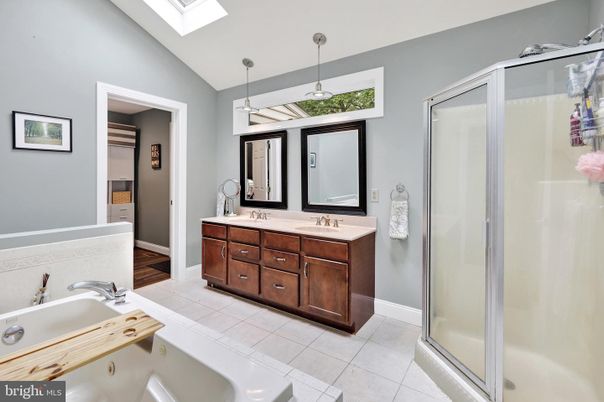 Bathroom, Dual Sink Vanities, Glass Shower, Interior, Pendant Lights, Tile Countertops