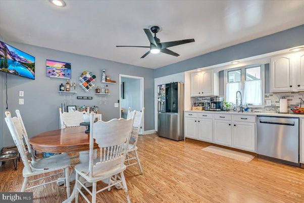 Dining room, Interior, Kitchen, Recessed Lighting, Stainless Steel Appliances, Wood Texture Flooring