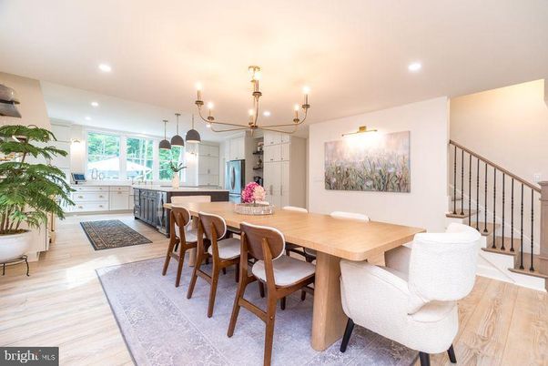 Chandelier, Dining room, Interior, Kitchen, Pendant Lights, Recessed Lighting, Stainless Steel Appliances, Wood Texture Flooring