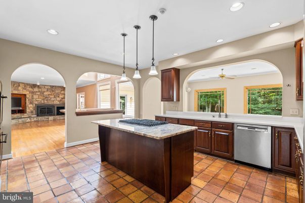 Fireplace, Interior, Kitchen, Pendant Lights, Recessed Lighting, Stone Walls