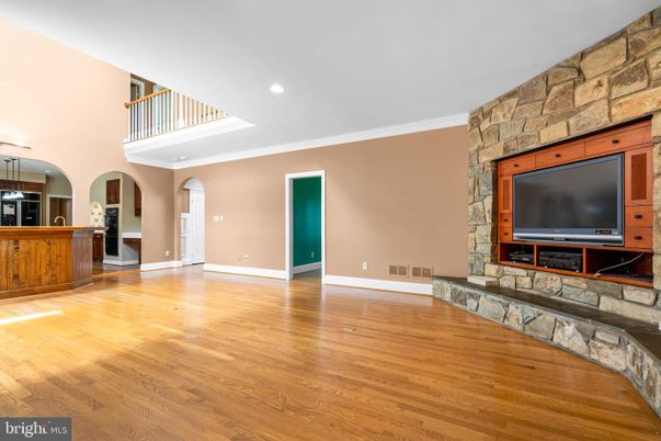 Fireplace, Interior, Recessed Lighting, Stone Walls, Wood Texture Flooring