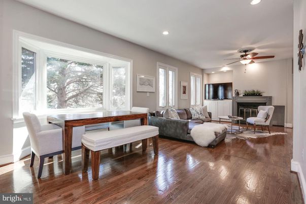 Dining room, Fireplace, Interior, Living room, Recessed Lighting, Wood Texture Flooring