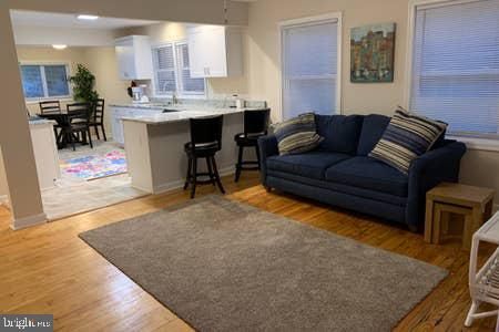 Dining room, Interior, Kitchen, Living room, Pendant Lights, Recessed Lighting, Wood Texture Flooring